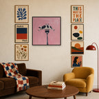 On a Fork, Deadpan mixed into a layered gallery wall of varied frame sizes.