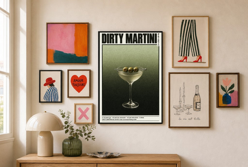 Dirty Martini mixed into a layered gallery wall of varied frame sizes.