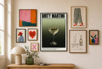 Dirty Martini mixed into a layered gallery wall of varied frame sizes.