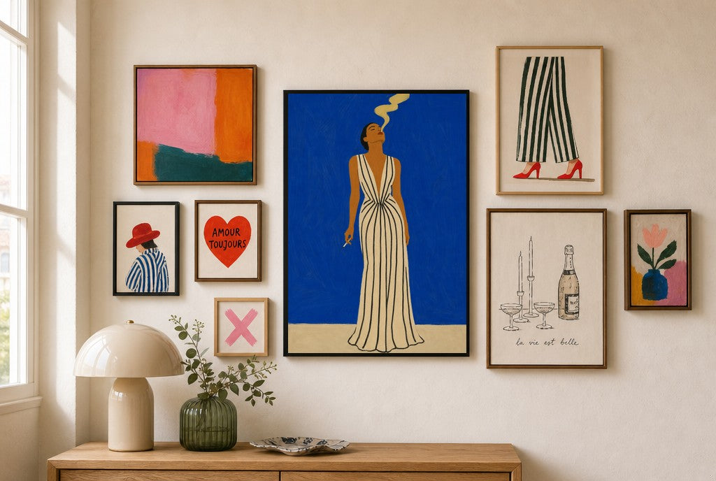 Striped Gown, Cobalt mixed into a layered gallery wall of varied frame sizes.