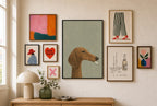 Whippet, Cigarette mixed into a layered gallery wall of varied frame sizes.