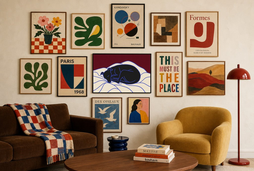 Sleeping Greyhound mixed into a layered gallery wall of varied frame sizes.