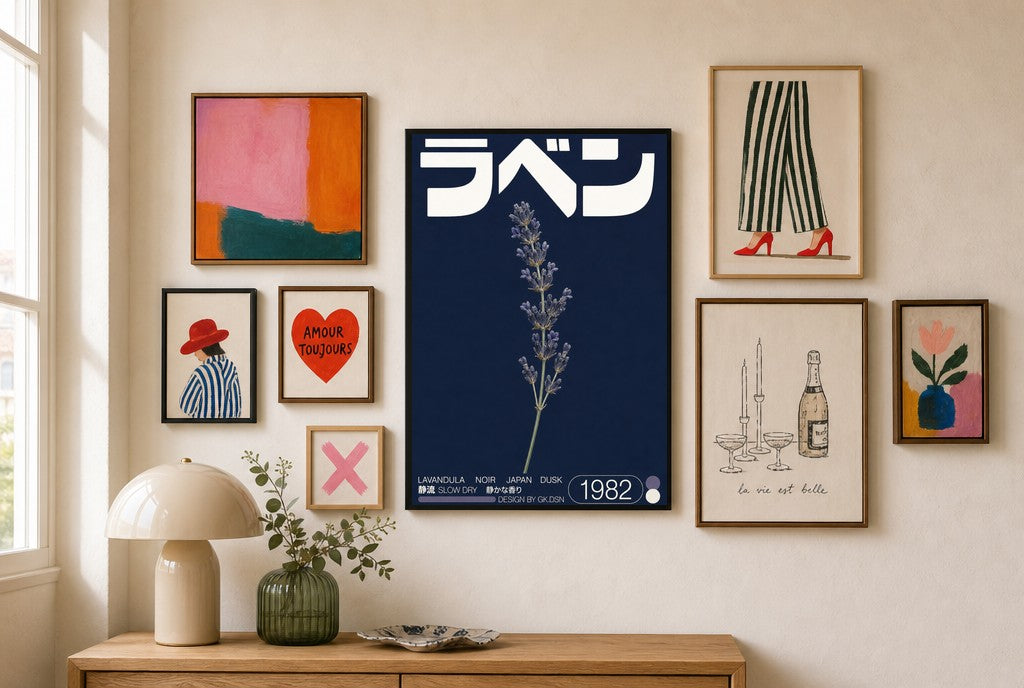 Lavender, Navy mixed into a layered gallery wall of varied frame sizes.