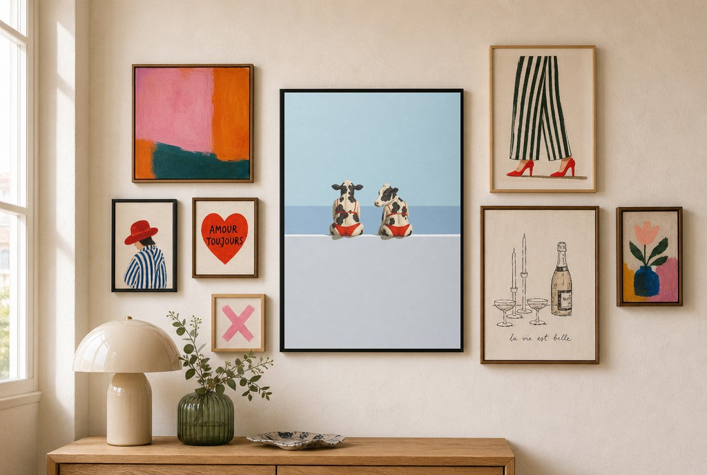 Best Friends in Red mixed into a layered gallery wall of varied frame sizes.
