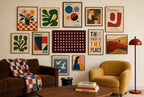Cream Dots, Oxblood mixed into a layered gallery wall of varied frame sizes.