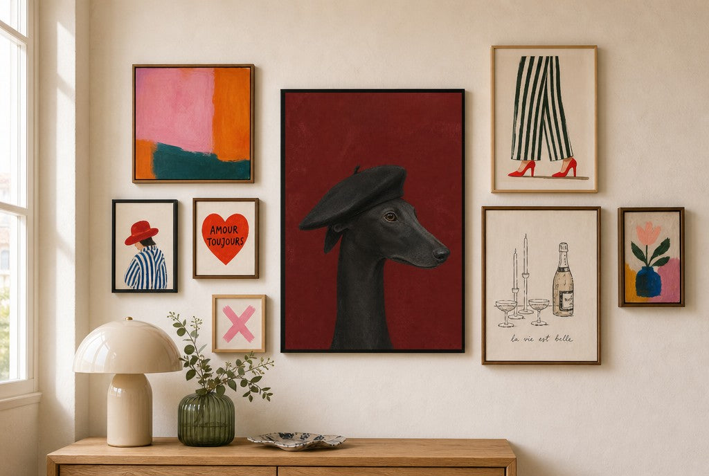 Greyhound, Black Beret mixed into a layered gallery wall of varied frame sizes.