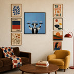 Showing Off mixed into a layered gallery wall of varied frame sizes.