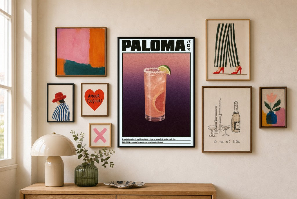 Paloma mixed into a layered gallery wall of varied frame sizes.