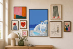 Santorini, Solo mixed into a layered gallery wall of varied frame sizes.
