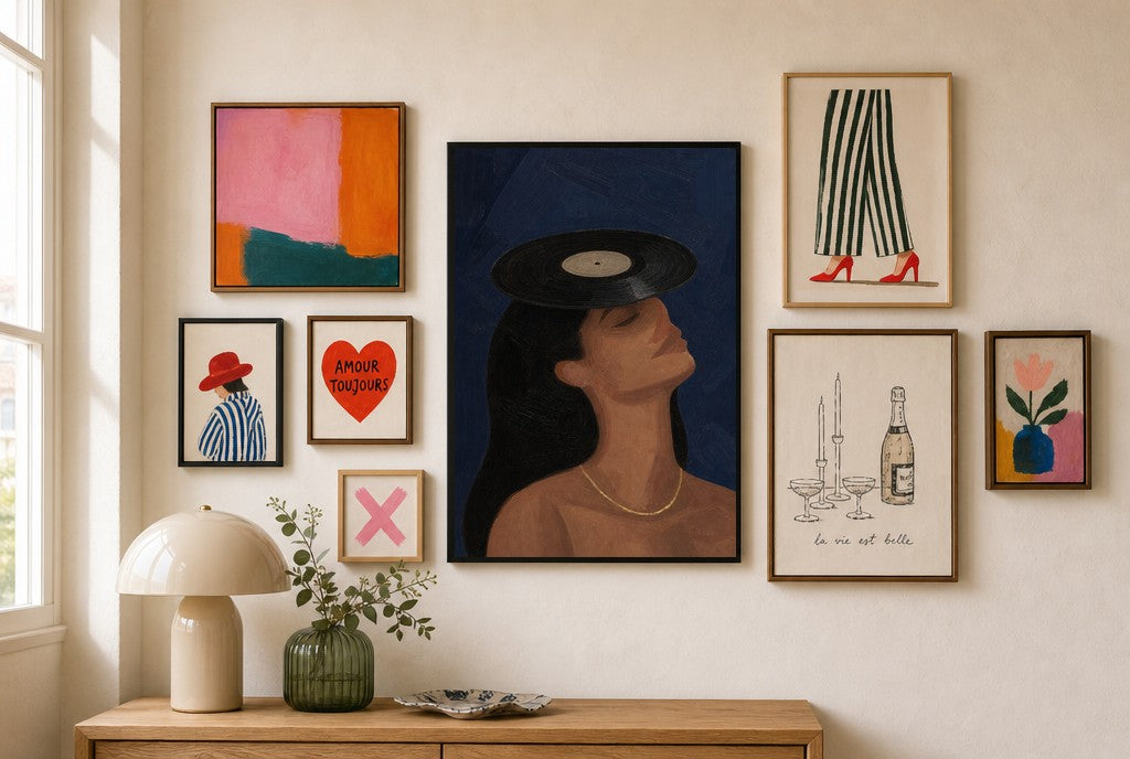 Vinyl on Her Head mixed into a layered gallery wall of varied frame sizes.