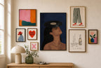 Vinyl on Her Head mixed into a layered gallery wall of varied frame sizes.