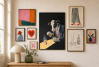 Two Fingers, Neat mixed into a layered gallery wall of varied frame sizes.