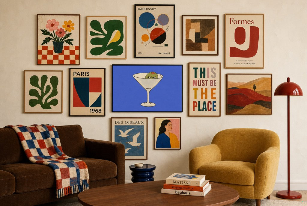 Angry Olive, Martini mixed into a layered gallery wall of varied frame sizes.