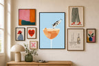 Last Call Belly Flop mixed into a layered gallery wall of varied frame sizes.