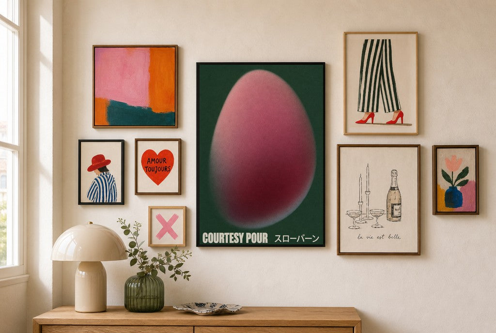 Courtesy Pour, Capsule mixed into a layered gallery wall of varied frame sizes.