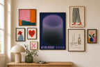 After Hours, Purple mixed into a layered gallery wall of varied frame sizes.