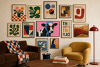 Gingham and Cat-Eyes mixed into a layered gallery wall of varied frame sizes.