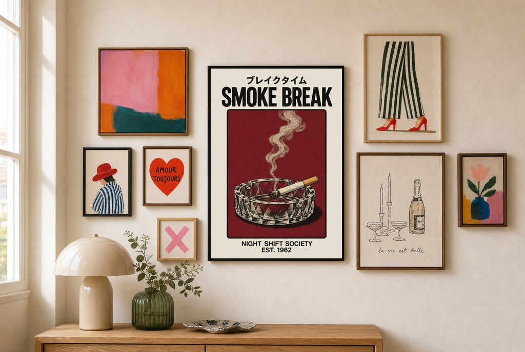 Smoke Break, 1962 mixed into a layered gallery wall of varied frame sizes.