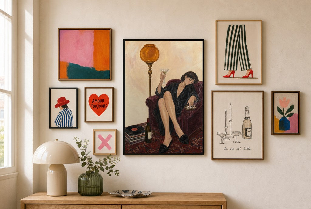 Robe, Amber Lamp mixed into a layered gallery wall of varied frame sizes.