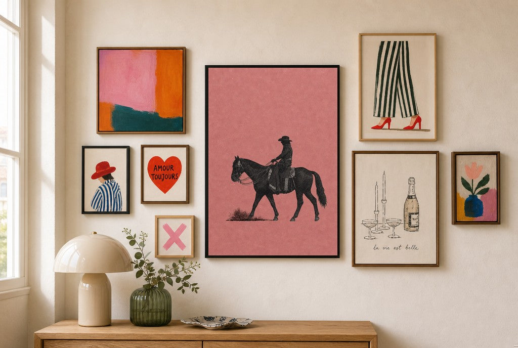 Cowgirl, Dusty Pink mixed into a layered gallery wall of varied frame sizes.