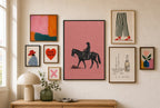 Cowgirl, Dusty Pink mixed into a layered gallery wall of varied frame sizes.