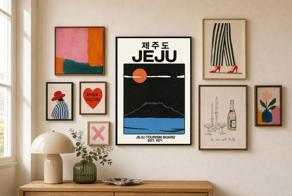 Jeju, 1971 mixed into a layered gallery wall of varied frame sizes.