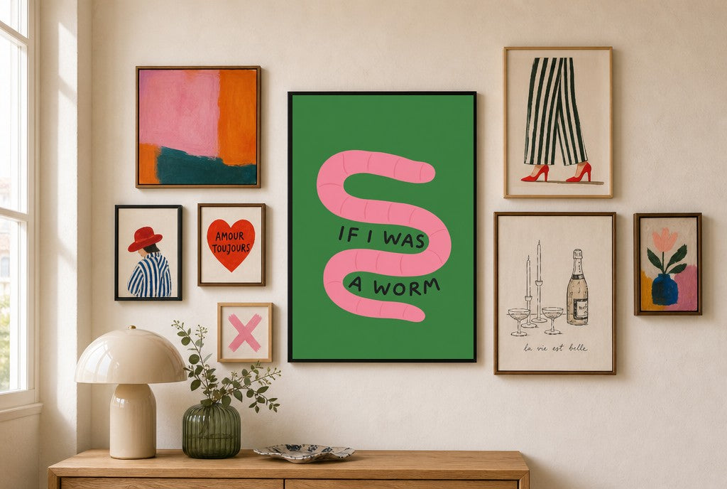 If I Was a Worm mixed into a layered gallery wall of varied frame sizes.