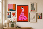 Polka in Motion mixed into a layered gallery wall of varied frame sizes.
