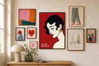 Saint Monday mixed into a layered gallery wall of varied frame sizes.
