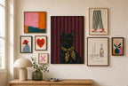 Cat, Leopard Scarf mixed into a layered gallery wall of varied frame sizes.