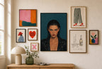 Leather Jacket, Teal mixed into a layered gallery wall of varied frame sizes.