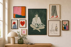 Fishnets, Magazine mixed into a layered gallery wall of varied frame sizes.