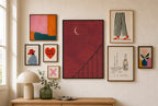 Oxblood Sky, Crescent mixed into a layered gallery wall of varied frame sizes.
