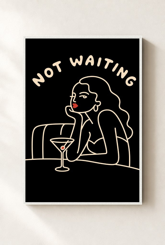 Not Waiting print, mounted in a white wood frame on a cream wall.