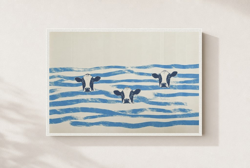 Three in the Waves print, mounted in a white wood frame on a cream wall.