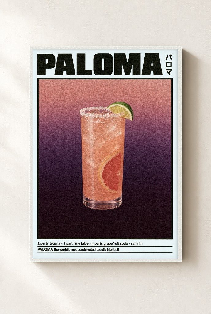 Paloma print, mounted in a white wood frame on a cream wall.