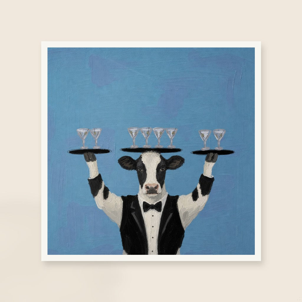 Showing Off print, mounted in a white wood frame on a cream wall.