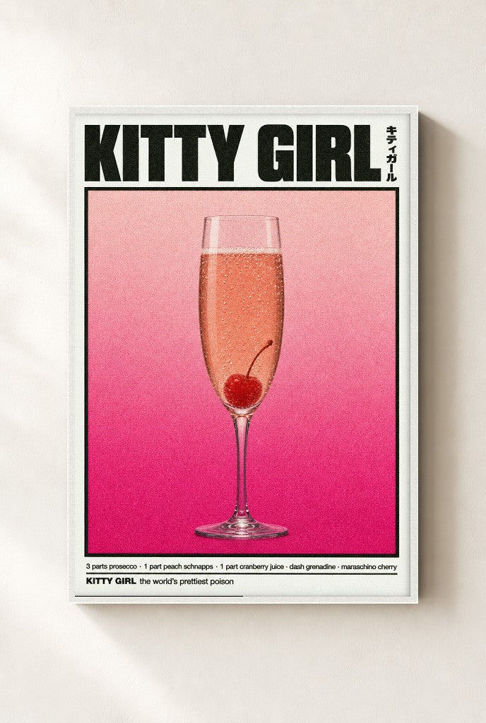Kitty Girl print, mounted in a white wood frame on a cream wall.