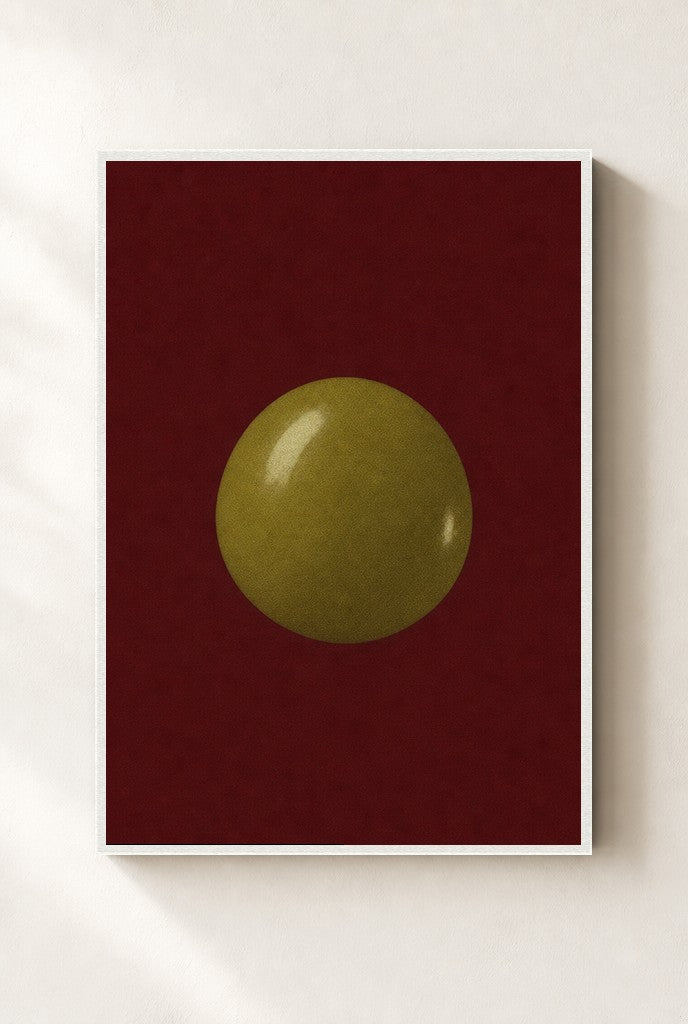 One Olive, Oxblood print, mounted in a white wood frame on a cream wall.
