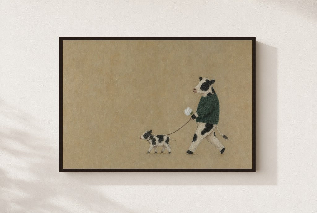 Just the Two of Us print, mounted in a walnut wood frame on a cream wall.