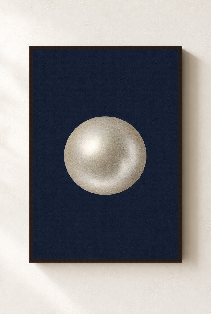 One Pearl, Navy print, mounted in a walnut wood frame on a cream wall.