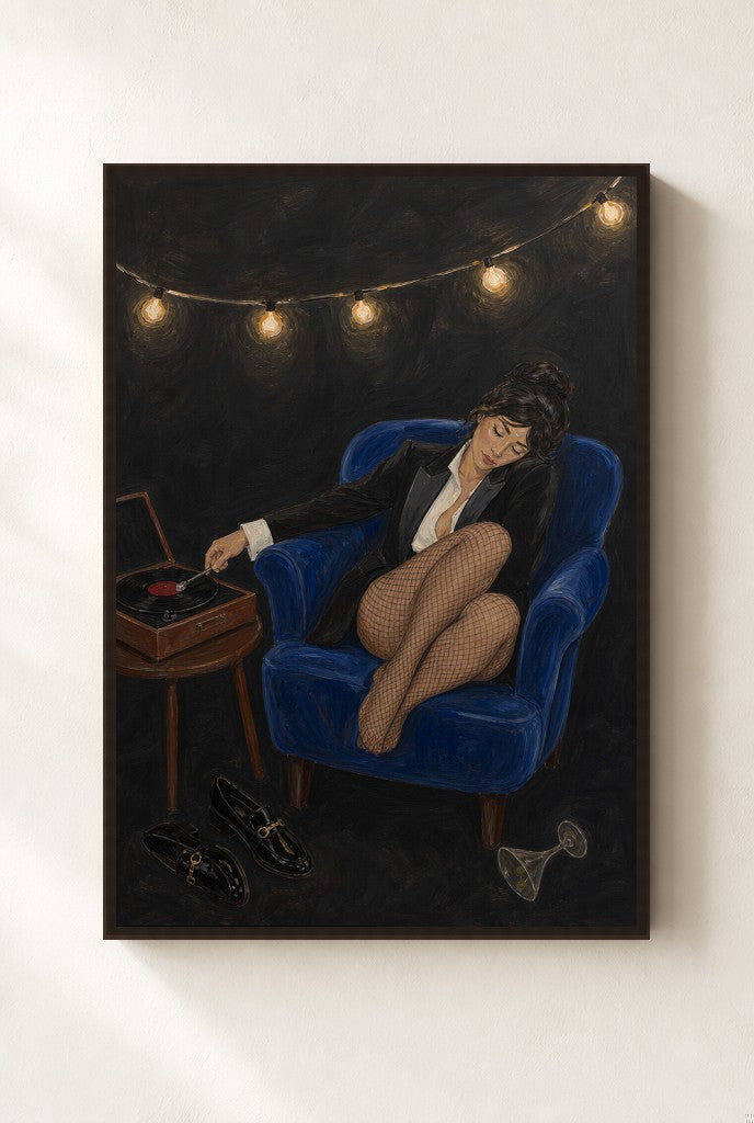 Tux, Vinyl, Cobalt print, mounted in a walnut wood frame on a cream wall.