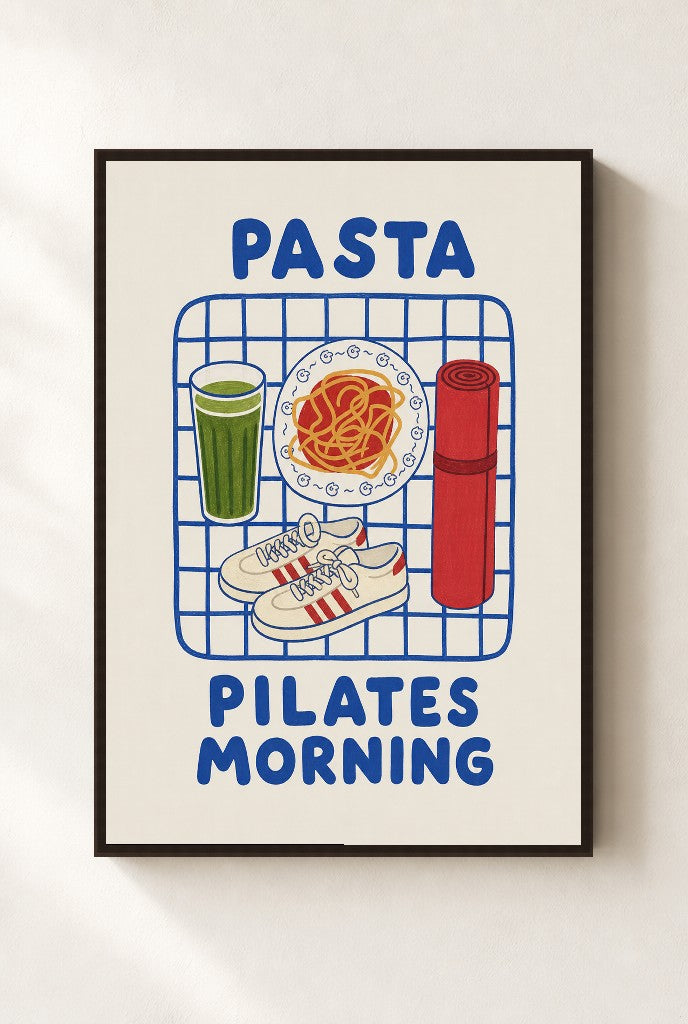 Pasta Pilates Morning print, mounted in a walnut wood frame on a cream wall.