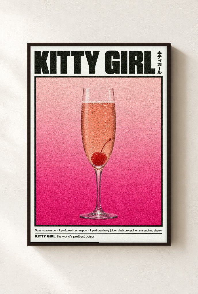 Kitty Girl print, mounted in a walnut wood frame on a cream wall.