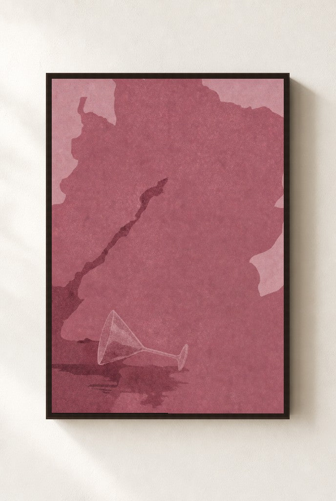 Spilled Martini, Oxblood print, mounted in a walnut wood frame on a cream wall.