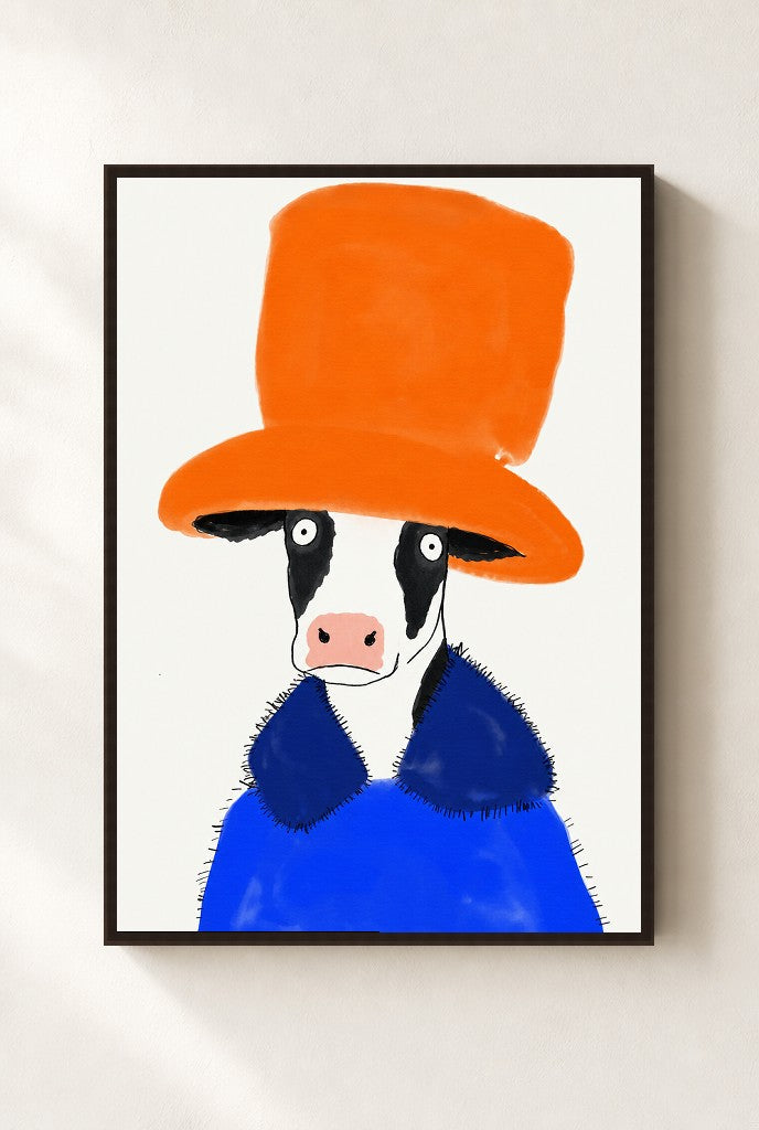 Big Hat Energy print, mounted in a walnut wood frame on a cream wall.
